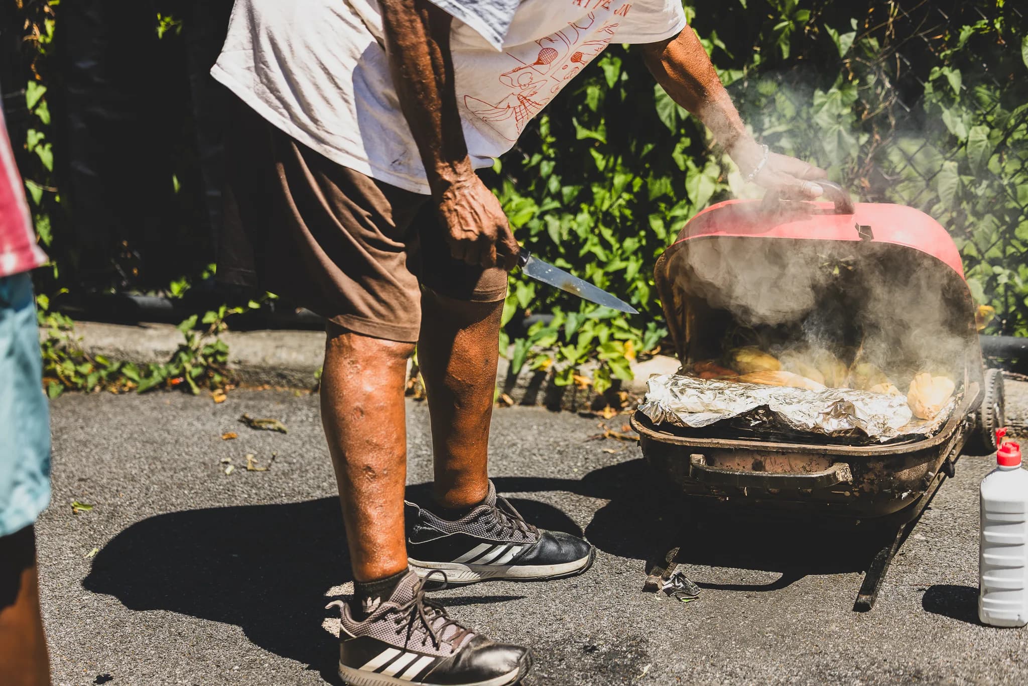A cookout beside the courts at Frederick Johnson Playground.