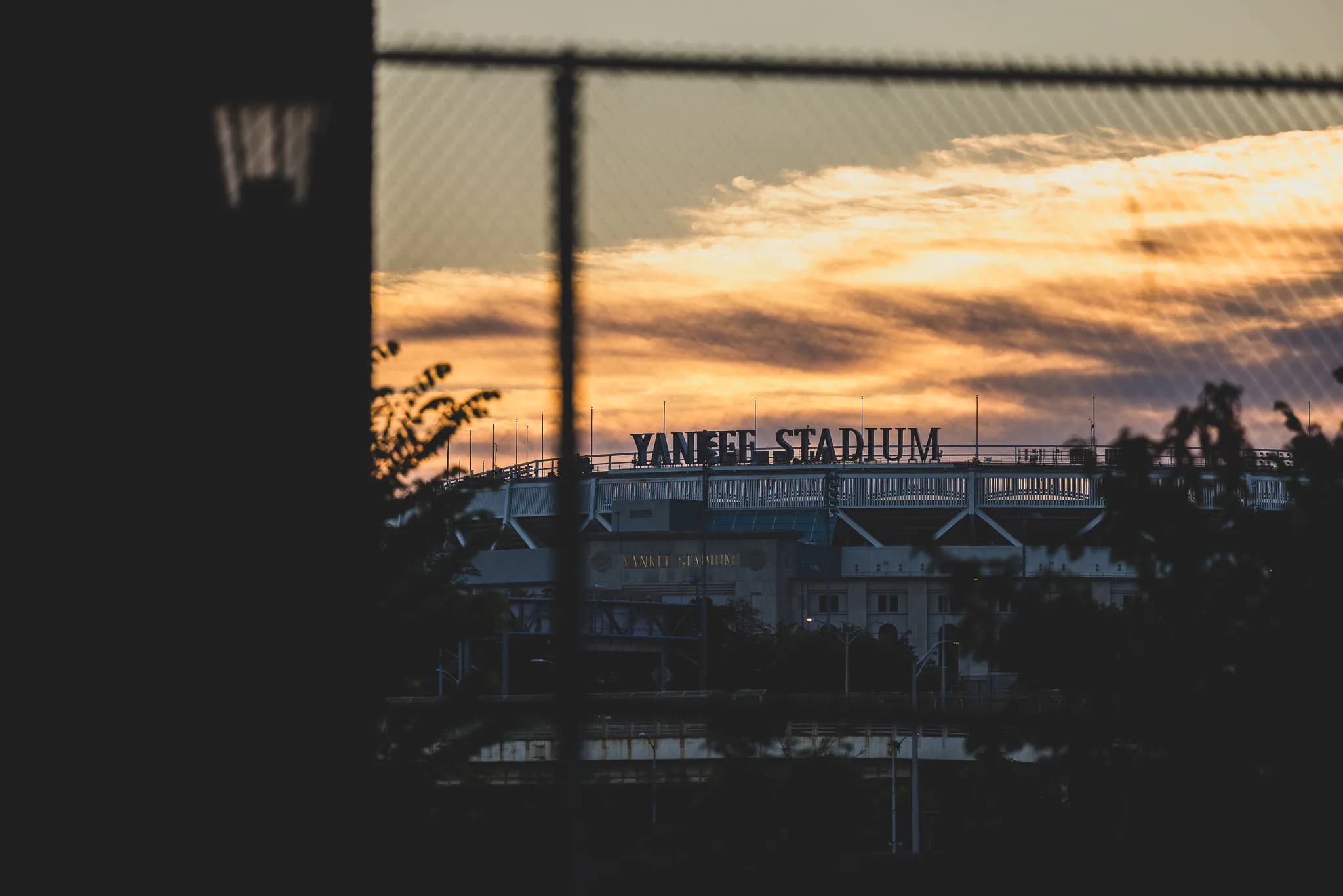 Yankee Stadium at sunset, seen from the Frederick Johnson courts.